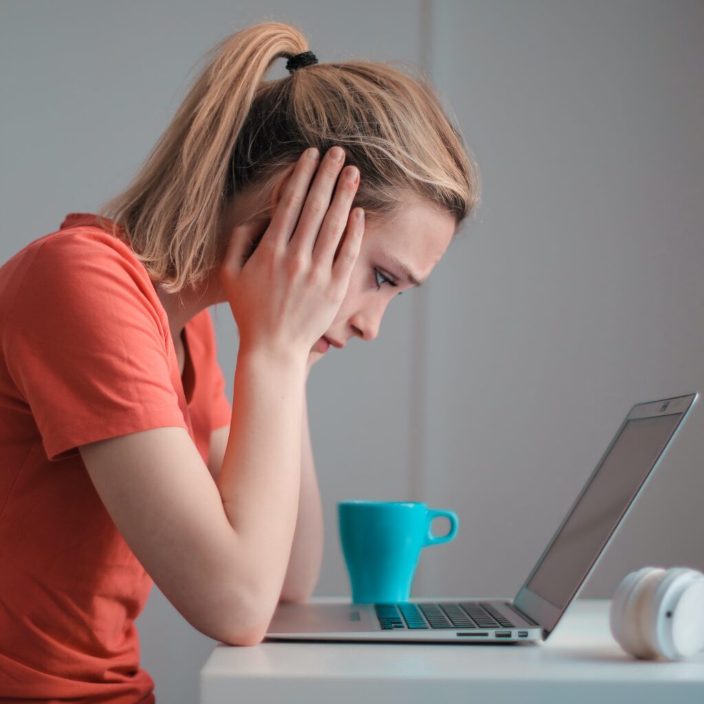 sad woman with a computer virus