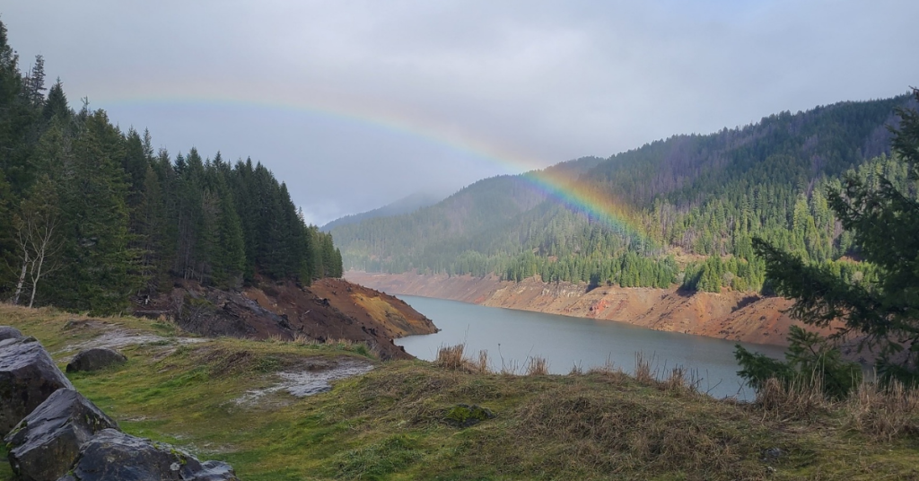 rainbow over oregon river symbolizing can weather slow wifi internet speeds