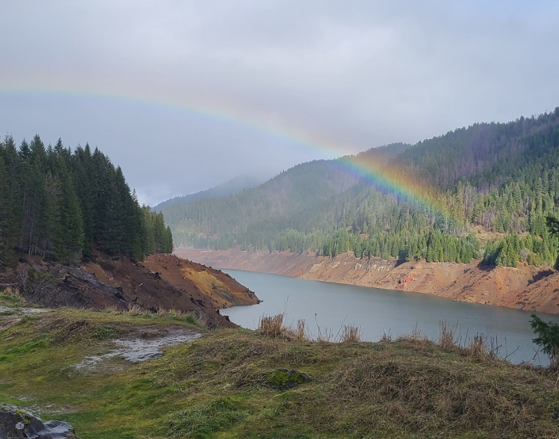 rainbow over oregon river symbolizing can weather slow wifi internet speeds