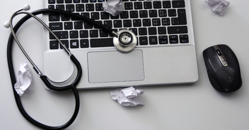 computer with stethoscope on it symbolizing device lifespan