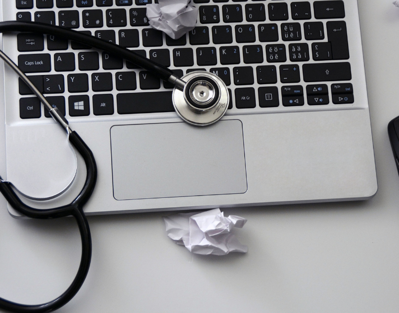 computer with stethoscope on it symbolizing device lifespan